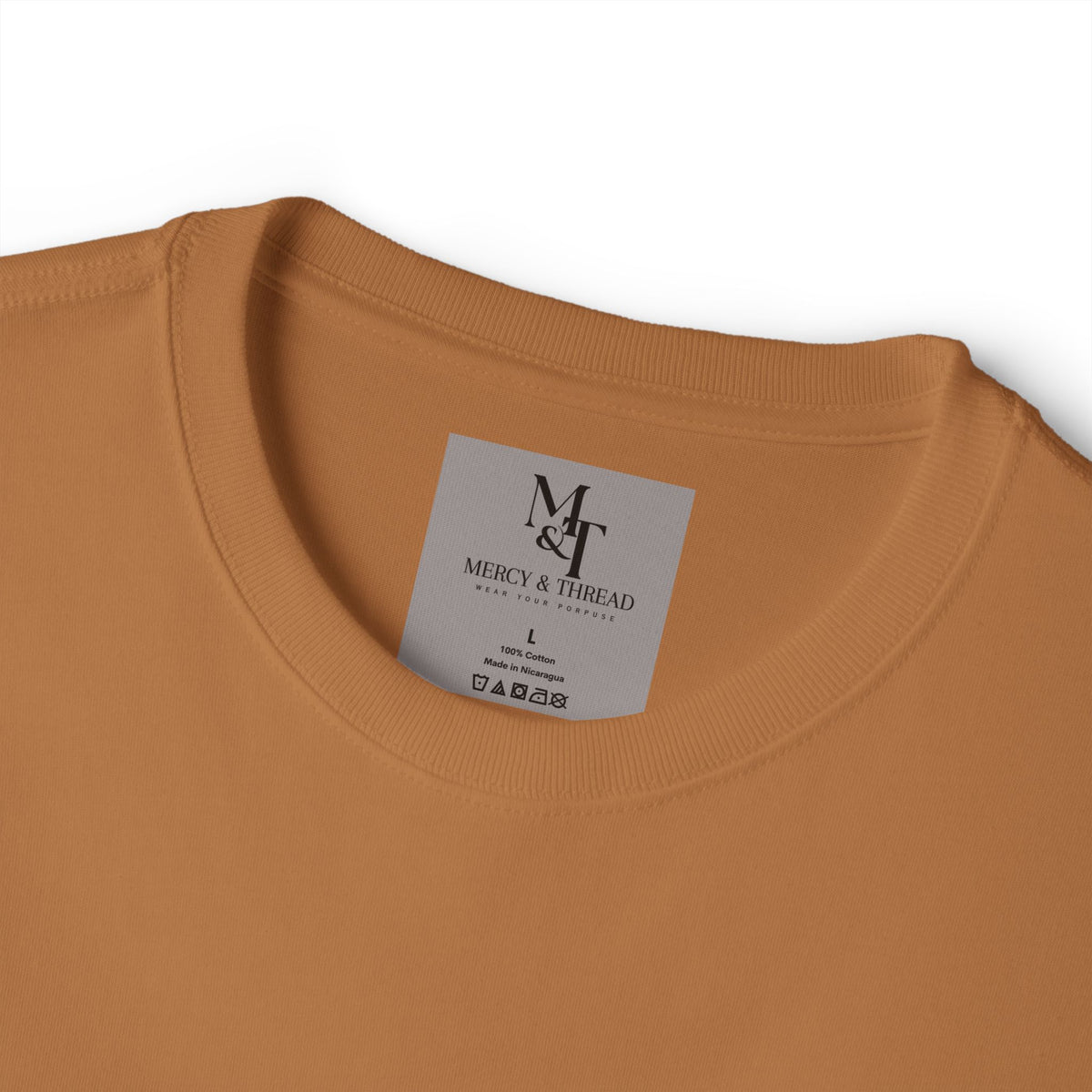 Greater is He Tee — Oversized Boxy T-Shirt (M&T Logo)