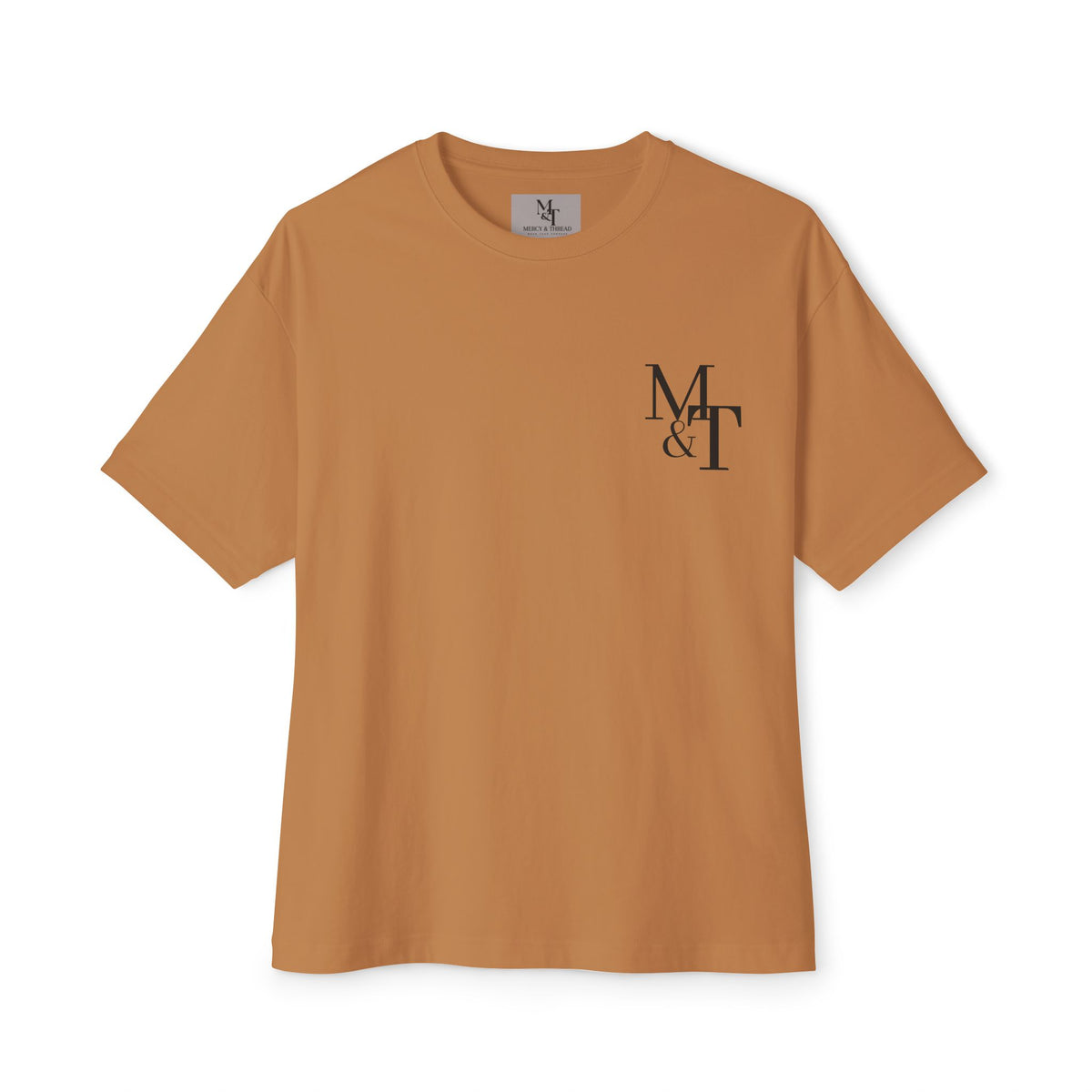 Greater is He Tee — Oversized Boxy T-Shirt (M&T Logo)