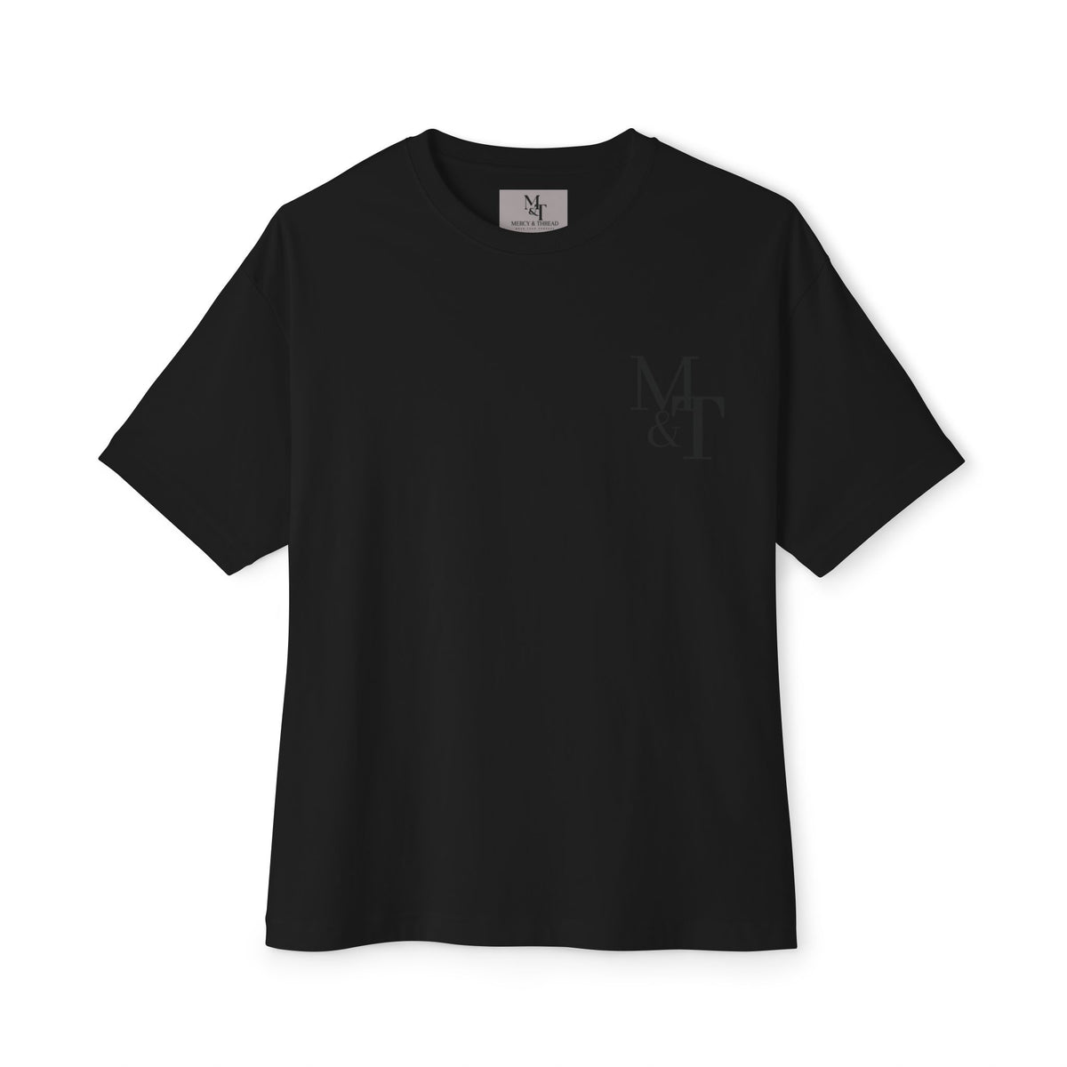 Greater is He Tee — Oversized Boxy T-Shirt (M&T Logo)